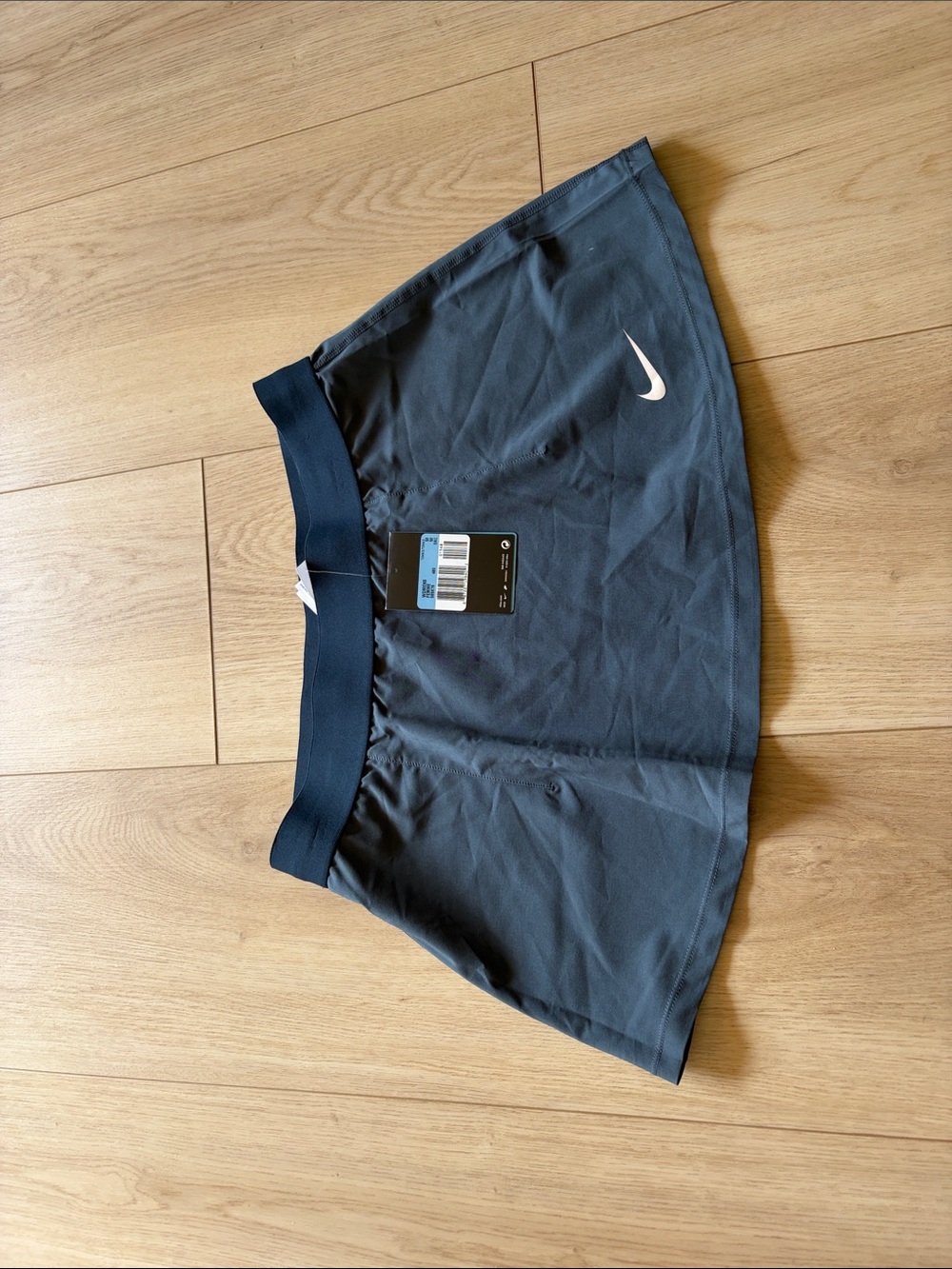 Nike Women's Dark Blue Athletic Tennis Skirt with White Swoosh